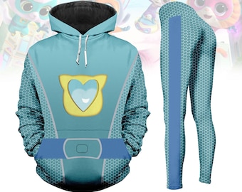 May include: A light blue hoodie and leggings set. The hoodie features a yellow heart-shaped design with a smiling face and a blue belt. The leggings have a blue stripe down the side and a honeycomb pattern.