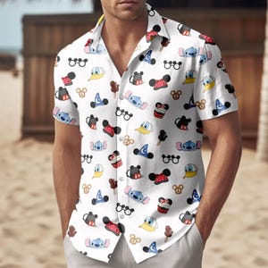 May include: White short-sleeved shirt featuring a repeating pattern of cartoon characters and icons. The design includes Mickey Mouse, Donald Duck, Stitch, ice cream bars, pretzels, and glasses. The shirt has a classic collar.