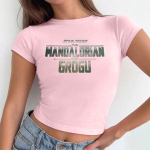 The Mandalorian and Grogu Baby Tee, Star Wars Text Logo Crop Top, Grogu Bounty Hunter Shirt, Grogu Fan Gift, Y2K Trendy Tee