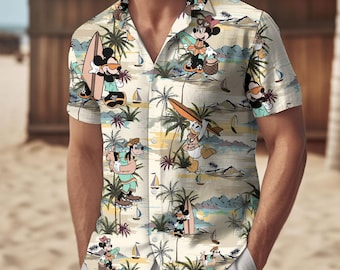 May include: A beige short-sleeved button-down shirt with a tropical print featuring Mickey Mouse, Minnie Mouse, Donald Duck, and Goofy. The print also includes palm trees, surfboards, and boats.