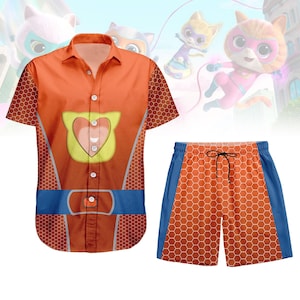 May include: An orange button-down shirt and matching shorts set. The shirt features a cartoon cat design with a heart-shaped emblem. The shorts have a drawstring waist and blue side panels. The set has a honeycomb pattern.