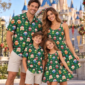 May include: A green short-sleeved button-down shirt and a sleeveless dress featuring a repeating pattern of Muppet characters wearing Santa hats, interspersed with small white snowflakes and candy canes, worn by a family in a coordinated set.