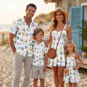 May include: A white short-sleeved button-down shirt, a white sleeveless dress, a white short-sleeved button-down shirt, and a white sleeveless dress, all featuring a repeating colorful graphic print of cocktails and the text Poor Choices.