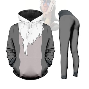 Peut inclure: Un ensemble de sweat à capuche et de leggings gris. Le sweat à capuche présente un motif blanc et gris ressemblant à la poitrine et au cou d'un babouin. Les leggings sont gris unis. Une illustration de babouin est en arrière-plan.