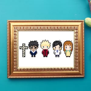 May include: A framed cross-stitch artwork featuring five pixelated figures and a cross. The figures are in various outfits, with black, blonde, and brown hair. The frame is gold-colored, and the background is a teal color.