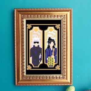 May include: A framed pixel art print featuring two figures in black and purple outfits standing in golden frames with intricate details. The background is black with gold accents.