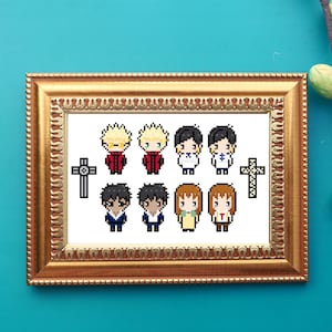 May include: A framed cross-stitch artwork featuring pixelated figures in various outfits. The gold-colored frame surrounds the cross-stitch, which includes two black crosses and several small, colorful characters. The background is a bright teal.