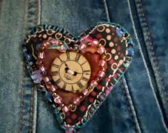 Handstitched fabric heart shaped pin with wooden button
