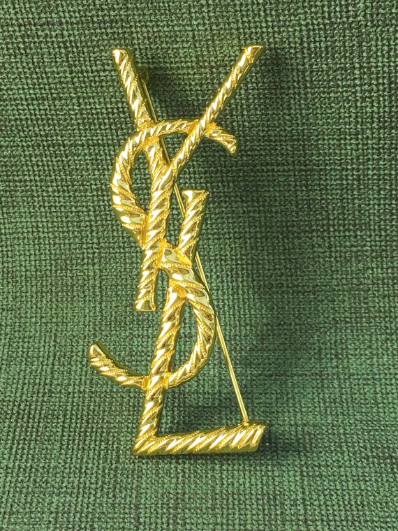 ヴィンテージ イヴ・サンローランのゴールドブローチ - Etsy 日本