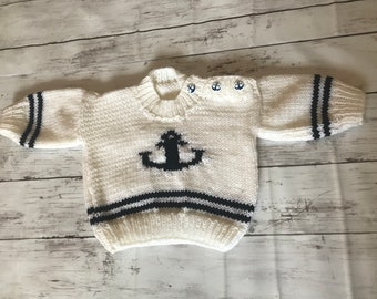 Hand Knitted Baby Jumper with Anchor Detail.