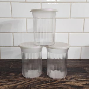 Tupperware Ribbed Storage Containers Set Of 3 #3586A Clear With Opalescent Seals #3590A