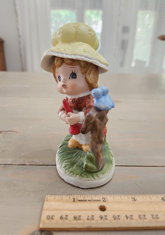 Vintage Ceramic Little Girl Figurine With Yellow Bonnet and Blue