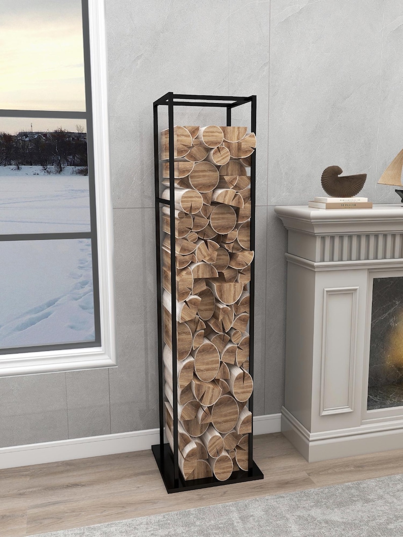 May include: A black metal log rack with stacked firewood inside. The rack is standing on a wooden floor in front of a fireplace.