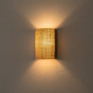 Oak wood wall sconce with a half-cylinder shade in natural jute burlap fabric, with optional plug. Boho style. image 8