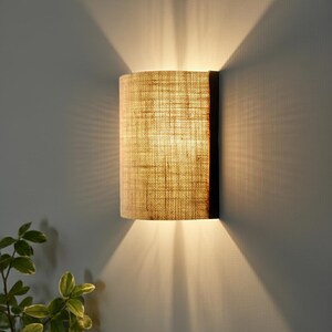 Oak wood wall sconce with a half-cylinder shade in natural jute burlap fabric, with optional plug. Boho style. image 9