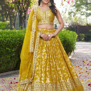 Yellow Lehenga Choli: Indian Wedding Wear with Zari Embroidery