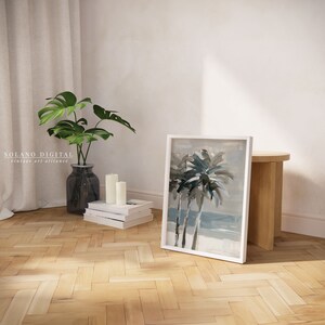 Printable wall art featuring abstract brushstrokes of palm trees with an ocean backdrop, available for digital download on Etsy. Ideal for adding a serene coastal vibe to any room, perfect for beach lovers and modern art enthusiasts.