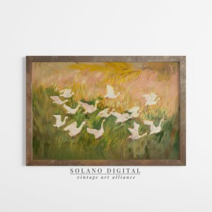 Charming painting of white geese in a vibrant meadow, perfect for nursery or cottagecore decor. Available as a printable digital download on Etsy, this abstract vintage artwork adds a whimsical touch to any farmhouse or vintage-themed space.