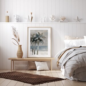 Printable wall art featuring abstract brushstrokes of palm trees with an ocean backdrop, available for digital download on Etsy. Ideal for adding a serene coastal vibe to any room, perfect for beach lovers and modern art enthusiasts.