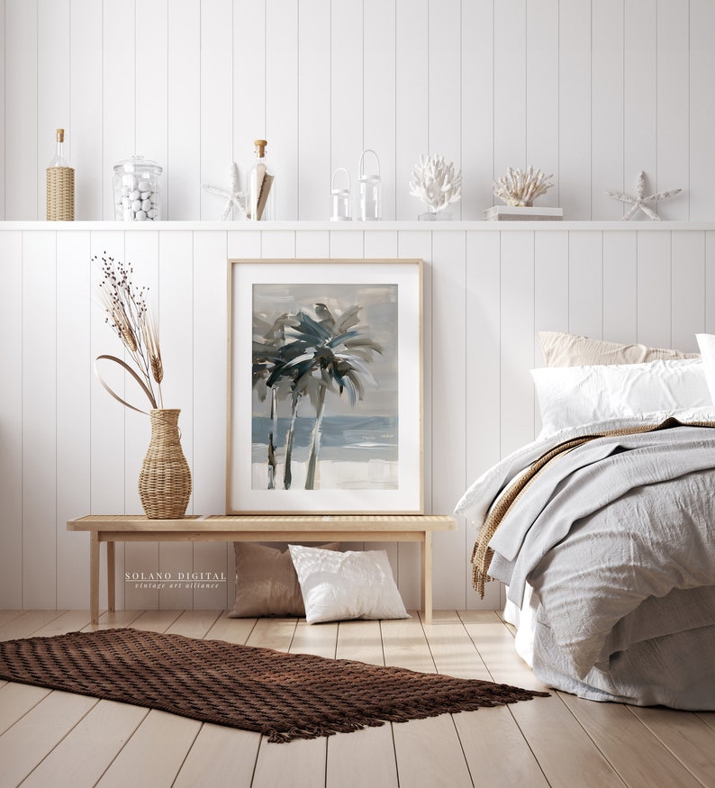 Printable wall art featuring abstract brushstrokes of palm trees with an ocean backdrop, available for digital download on Etsy. Ideal for adding a serene coastal vibe to any room, perfect for beach lovers and modern art enthusiasts.