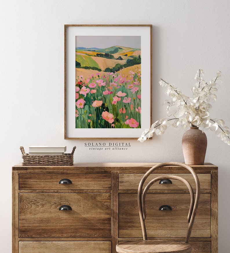 Vibrant floral landscape wall art printable featuring blooming pink flowers against rolling green hills. Perfect for adding a touch of nature and color to any space. Available on Etsy for easy download and print.