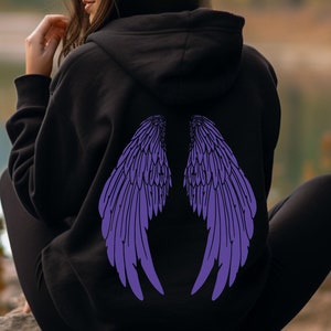 May include: Black hoodie with a purple angel wing design on the back. The word "VIOLET" is printed on the bottom right corner of the image.