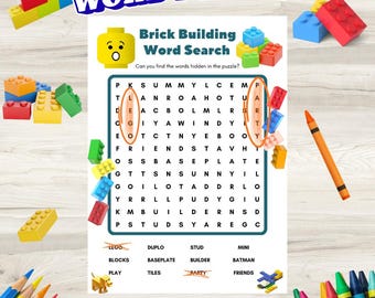 May include: A colorful word search puzzle titled "Brick Building Word Search" with the text "WORD PUZZLE" at the top. The puzzle features a grid of letters, colorful building blocks, and an orange crayon. The puzzle includes words like "DUPLO" and "STUD".