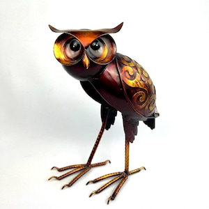 Charming metal owl figurine. Handcrafted openwork metal art. Patinated brass look. Garden decoration owl. Artful metal sculpture.