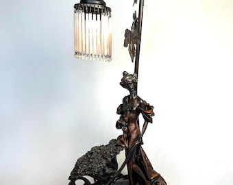 French table lamp with pearl hangings and girl figure in Art Nouveau style. Unique bedside lamp statue. Cast metal with pearl lampshade.