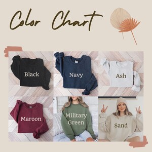 May include: Color chart showing different sweatshirt colors: black, navy, ash, maroon, military green, and sand.