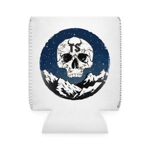 May include: White can cooler with a black and white skull graphic against a blue starry sky background. The skull has the letters "TS" on its forehead.