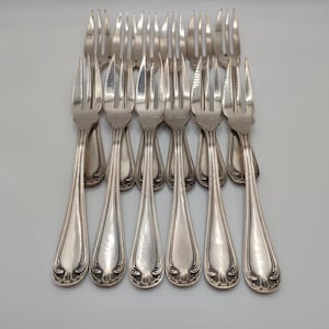 12 silver-plated metal cake forks, by Boulenger.