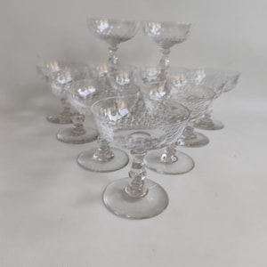 12 Baccarat crystal champagne glasses, circa 1920.