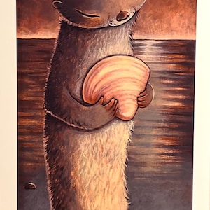 May include: A painting of a gray otter holding a large pink seashell. The otter is standing on a sandy beach with a sunset in the background. The painting is signed "Cmallweaver" and numbered "1/250".