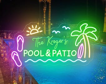May include: Neon sign with the text "The Kroger's Pool & Patio" in a green, yellow, and pink color scheme. The sign is in front of a swimming pool with candles on the edge.
