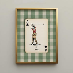 Vintage golf art print featuring an ace of clubs playing card with a classic golfer in mid-swing against a green gingham background. Displayed in a slim gold hardwood frame, this preppy country club wall art adds timeless character to offices, studies, clubhouses, libraries, and masculine interiors.