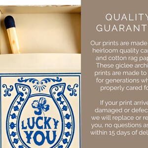 May include: A matchbox with a blue and white design that says "LUCKY YOU". A single match with a black tip is visible inside the open box. The text "QUALITY GUARANTEE" is also visible.