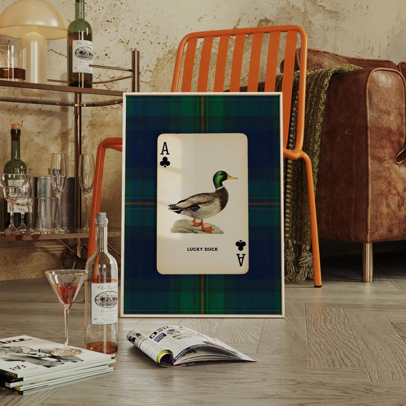 Mallard duck illustration on vintage ace of clubs playing card with green and blue plaid background, rustic preppy style
