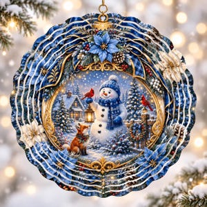 Snowman, fox, and cardinals in snowy village scene, framed by blue and white winter wreath.