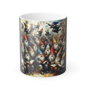 May include: White ceramic mug featuring a colorful illustration of a gathering of gnomes with long white beards and pointed hats. The gnomes are reading books and wearing various colored hats, including red, green, and yellow.