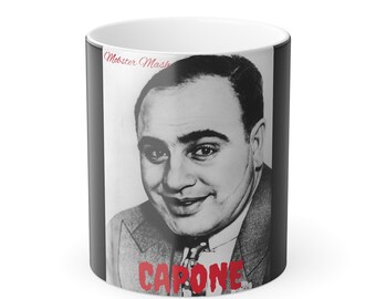 May include: A black and white mug with a photo of Al Capone. The mug has the words "Mobster Mash" and "CAPONE" in red.