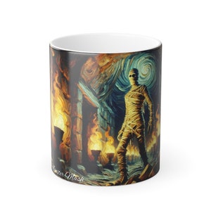May include: A white ceramic mug with a colorful image of a mummy standing in a dark, fiery room. The image is stylized with brushstrokes, giving it a painterly look. The text "Mummy Mash" is visible at the bottom of the mug.