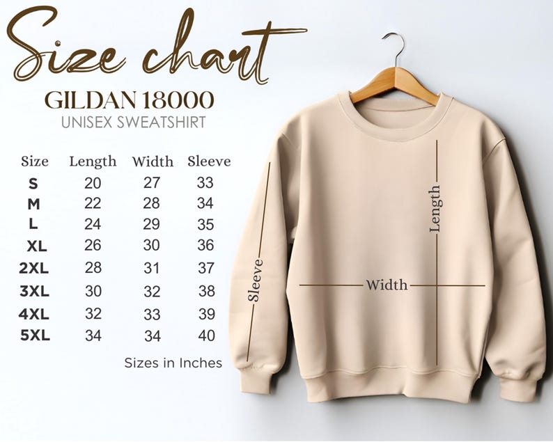 May include: A beige Gildan 18000 unisex sweatshirt hangs on a wooden hanger. A size chart is displayed, showing measurements in inches for length, width, and sleeve for sizes S to 5XL. The text "Size chart" is at the top.