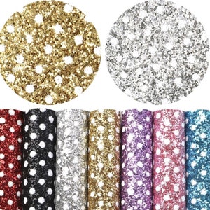 May include: Assortment of glitter fabric sheets with white polka dots in various colours, including red, black, silver, gold, purple, pink, and blue.