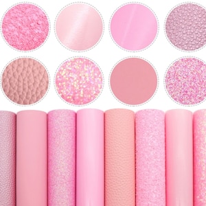 Peut inclure: Huit feuilles de simili cuir rose différentes avec différentes textures, notamment lisses, pailletées et gaufrées. Les feuilles sont disposées en grille.