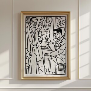 May include: Black and white line art print of two men in a bar setting, one standing and one sitting, both holding glasses of wine. The print is framed in a gold frame.