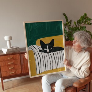 白黒猫のアートプリント、ミニマリストの猫のイラスト、居心地の良いペットの装飾、モダンな動物の壁アート、ストライプのブランケット