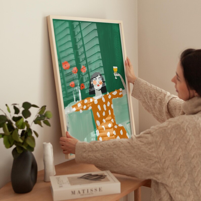 Woman in orange polka dot dress, holding wine glass, modern feminine print, bold green background, floral wall art, digital download, poster
