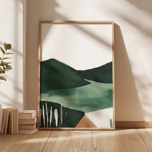 Pode incluir: Pintura abstrata de paisagem em tons de verde e branco, emoldurada em uma moldura de madeira clara. A pintura representa uma série de colinas e um rio.