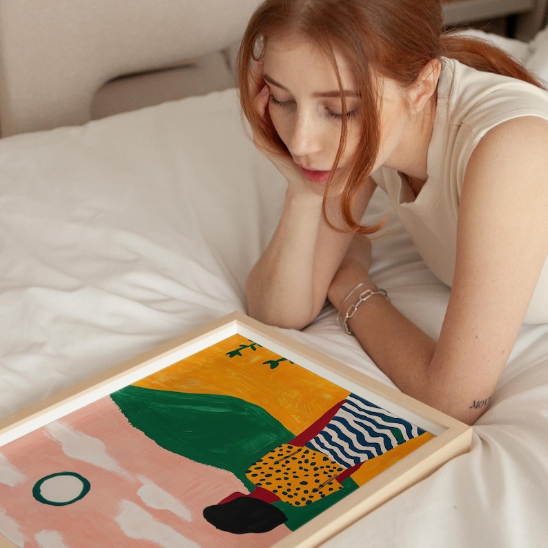 Colorful sunset landscape art print, modern abstract woman illustration, pink sky and green hills, polka dot and stripes outfit, nature-inspired decor